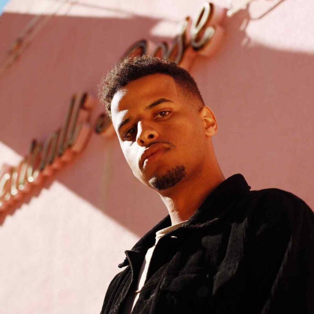 On “Enemy,” Christian Kuria’s Colorful Guitar Work and Celestial Vocals